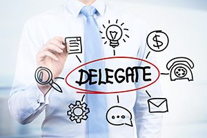 Photo of man trying to delegate
